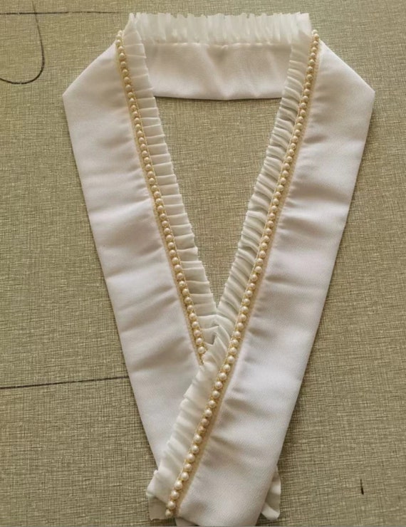 Close-up detail of han-eri collar for nagajuban, showing the white fabric collar attachment that creates the traditional layered neckline in kimono dressing