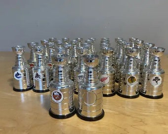 Vintage Labatt's Miniature Stanley Cups that were distributed in cases of Labatt beer. NHL teams Collectibles