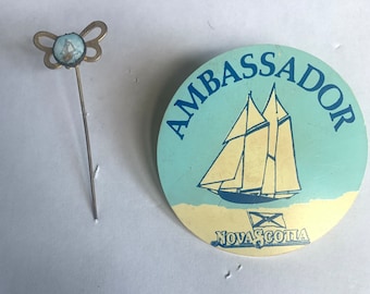 Nova Scotia Ambassador pinback button & stick, vintage