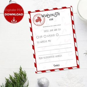Pode incluir: Uma lista de desejos de Natal branca com uma borda listrada vermelha e branca. A lista inclui seções para preencher as experiências e desejos do ano. A parte superior da lista tem o texto "Wunschliste" e um selo de Natal.