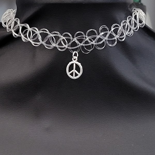 Clear tattoo choker with charm