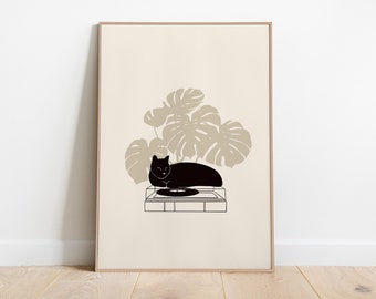 May include: A black cat is lying on a record player with a large monstera plant behind it. The image is in a minimalist style with a beige background.