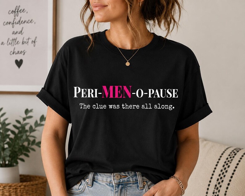 Modern graphic T-shirt featuring a witty perimenopause design shown on a relaxed lifestyle model indoors