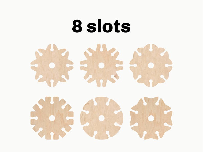 May include: Eight wooden discs with eight slots each. The discs are light brown and have a circular shape. The text "8 slots" is printed above the discs.
