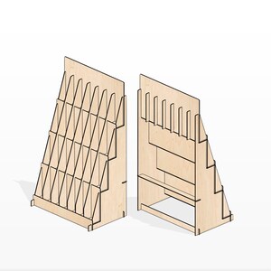 May include: Two wooden magazine display stands with angled shelves. The stand on the left has a larger capacity and is designed for holding magazines or brochures. The stand on the right has a smaller capacity and includes a shelf for displaying additional items.