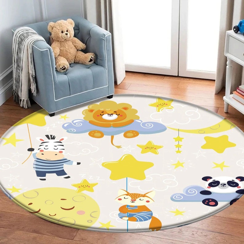 May include: A round, white and yellow children's rug with a cartoon lion, zebra, fox, and panda. The rug has a white background with yellow stars, clouds, and moons.
