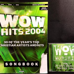 May include: A green and white songbook and CD case. The songbook is titled "WOW Hits 2004" and includes the text "30 of the Year's Top Christian Artists and Hits." The CD case is titled "WOW Worship."