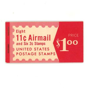 May include: A rectangular block of United States postage stamps. The stamps are for airmail, with the text "Eight 11¢ Airmail and Six 2¢ Stamps UNITED STATES POSTAGE STAMPS". The price is $1.00. The block is red and cream colored.