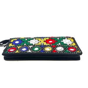 Majestuoso bolso de tela cosido a mano