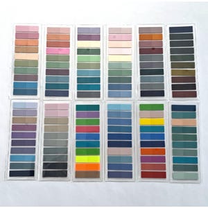 May include: A set of 16 color swatches, each with 10 different shades of color. The swatches are arranged in two rows of eight, with each row containing a different color family. The colors range from light to dark, and include shades of blue, green, purple, red, orange, yellow, brown, and gray.