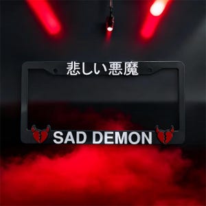 SAD DEMON – JDM License Plate Frame | Anime Car Accessory | Sad Aesthetic Plate Cover | Black Custom Plate Frame