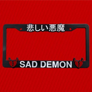 SAD DEMON – JDM License Plate Frame | Anime Car Accessory | Sad Aesthetic Plate Cover | Black Custom Plate Frame