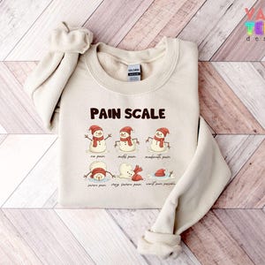 Christmas Nurse Sweatshirt: Funny Pain Scale Hoodie image 2