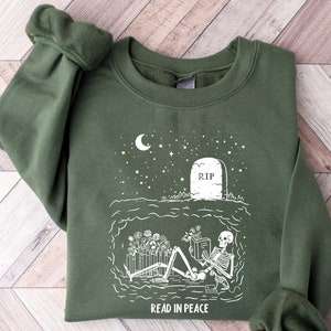 Read In Peace Halloween Sweatshirt, Skeleton Reading Halloween Sweatshirt, Halloween Librarian, Halloween Shirt, Teacher Gift, Boo School