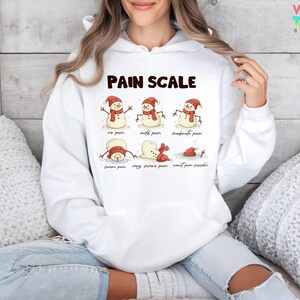 Christmas Nurse Sweatshirt: Funny Pain Scale Hoodie image 4