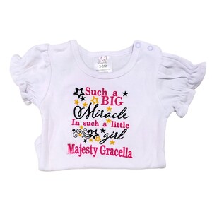 Miracle Girl Baby Bodysuit: Embroidered Cotton Ruffle Sleeve