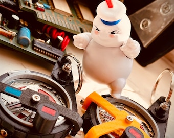 Ghostbusters Proton Pack CoinPro - Collectible Coin Keychain- Frozen Empire Elsa Pack and Classic Pack