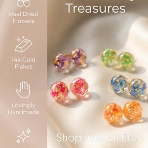 May include: Handmade resin earrings with real dried flowers and 14k gold flakes. The earrings are in various colours, including purple, green, red, blue, and orange. The text "Nature's Tiny Treasures" and "Shop now on Etsy" are visible.