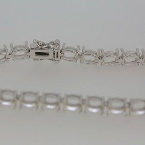 Sterlingzilveren semi-gemonteerde tennisarmband ovaal ovaal 6 x 4 mm