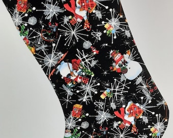 Atomic Christmas Stocking with Snowmen and Snow Women in Space