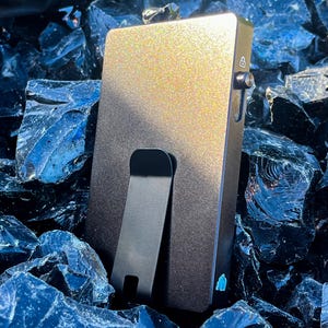 Cartera para teléfono con cierre magnético RFID de metal, automática, oculta, con clip para dinero y diseño minimalista de Primal Slide para hombre