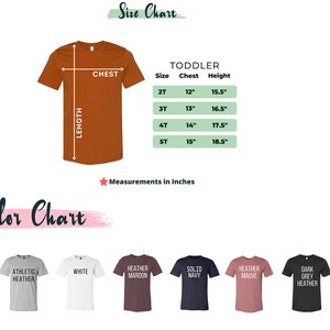 May include: Size chart for toddler t-shirts with measurements in inches for chest and height. Colour chart showing 10 different t-shirt colours: black, athletic heather, white, heather maroon, solid navy, heather mauve, dark grey heather, and pink.