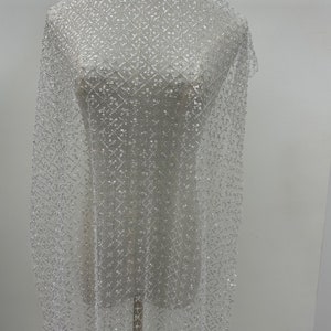 Timeless Elegance: Beaded Lace Fabrics for Weddings, Proms, and Parties