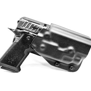 May include: A black handgun with a black holster. The holster has two screws on the bottom.