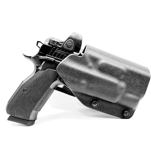 May include: A black handgun with a black holster and a red dot sight.