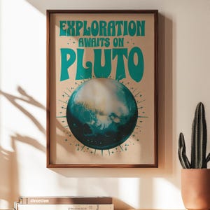 May include: A vintage-style poster with the text "Exploration Awaits on Pluto" in teal blue lettering. The poster features a teal blue and white illustration of Pluto with a starburst design around it.