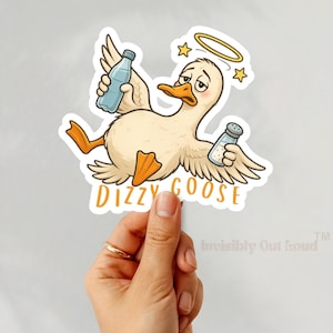 May include: A sticker depicting a cartoon goose with a halo, holding a water bottle and a salt shaker. The goose has a dazed expression and the words "Dizzy Goose" are written below it in orange.