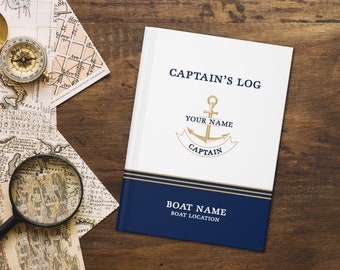 May include: A white and blue captain's log book with a gold anchor and the text "Captain's Log", "Your Name", "Captain", "Boat Name", and "Boat Location".