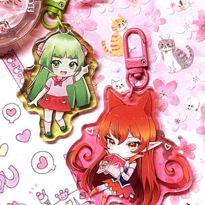 Mairimashita! Iruma-kun: Amelie Azazel and Clara Valac Acrylic Keychains