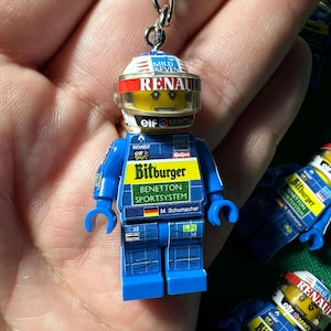 Llavero F1 Michael Schumacher 1995 Benetton B195 Campeones del mundo Fórmula 1 figura de piloto de Gran Premio minifigura minifigura