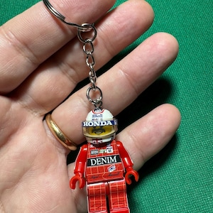 Nigel Mansell porte-clés 1986 Williams Mansell FW11 F1 formule 1 grand prix pilote figure pilote costume casque figurine figurine