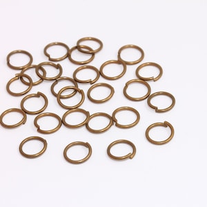 10 x 1,2 mm hoppringar i antikbrons, öppna hoppringar i brons, starka hoppringar, hoppringar i bulk, smyckestillverkningstillbehör, MBGDOM63