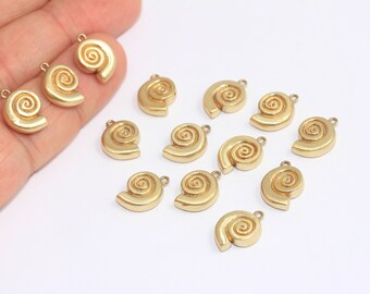 May include: A collection of 14 gold-toned metal seashell charms. Each charm features a detailed spiral design.