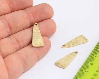 May include: Three gold-colored metal triangle-shaped pendants with a hammered texture. Each pendant has a small hole at the top for attaching a string or chain.