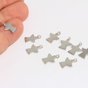 Può includere: Un set di dieci ciondoli a forma di angelo in argento con un anello per attaccarli a gioielli o altri oggetti artigianali.