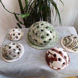 Handmade Ceramic Perforated Candle Holder – Decorative Light Transmitting Design