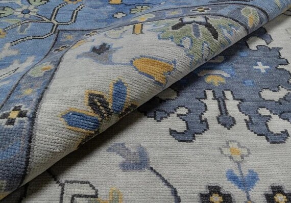 Hand-Knotted Oushak Rug: Ivory & Blue Wool, Modern Antique Style