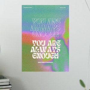 Könnte beinhalten: Ein Motivationsposter mit einem Regenbogen-Farbverlauf im Hintergrund und dem Text "You are always enough. Never forget." in Weiß.