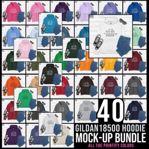 Puede incluir: Un paquete de maquetas de 40 sudaderas con capucha Gildan 18500 en varios colores. Las sudaderas con capucha se muestran con jeans y zapatillas. El texto "Place your wording design here" está en la sudadera con capucha blanca.