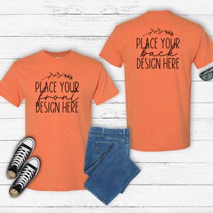 May include: Two orange t-shirts with short sleeves. The front t-shirt has the text "Place your front design here" and the back t-shirt has the text "Place your back design here".
