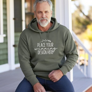 May include: A green hooded sweatshirt with the text "Place your winning design here" printed on the front.