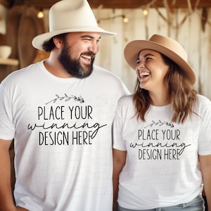 May include: Two people wearing white t-shirts with the text "Place your winning design here" printed on them. They are smiling and looking at each other.