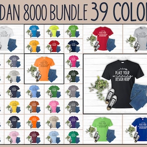 May include: A mockup of 39 different colored Gildan 8000 t-shirts, each with a white graphic that says "Place your winning design here". The shirts are laid out on a white wood background with jeans and sneakers.