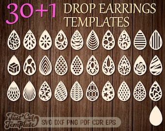 May include: A collection of 31 teardrop-shaped earring templates featuring various intricate cut-out patterns. The text 30+1 DROP EARRINGS TEMPLATES and Just Cut Template SVG DXF PNG PDF CDR EPS is visible on the dark wood-grain background.