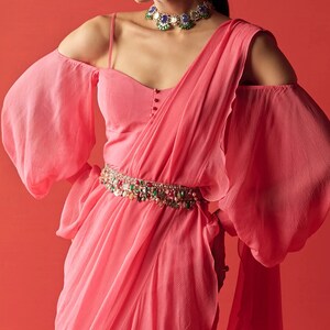 Pink Georgette Saree: Sleeveless Top with Pearl Accents