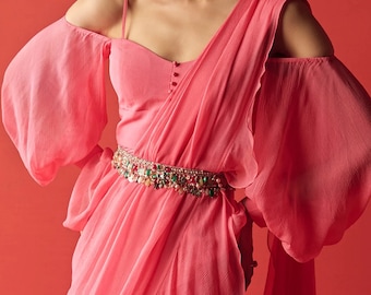 Pink Georgette Saree: Sleeveless Top with Pearl Accents